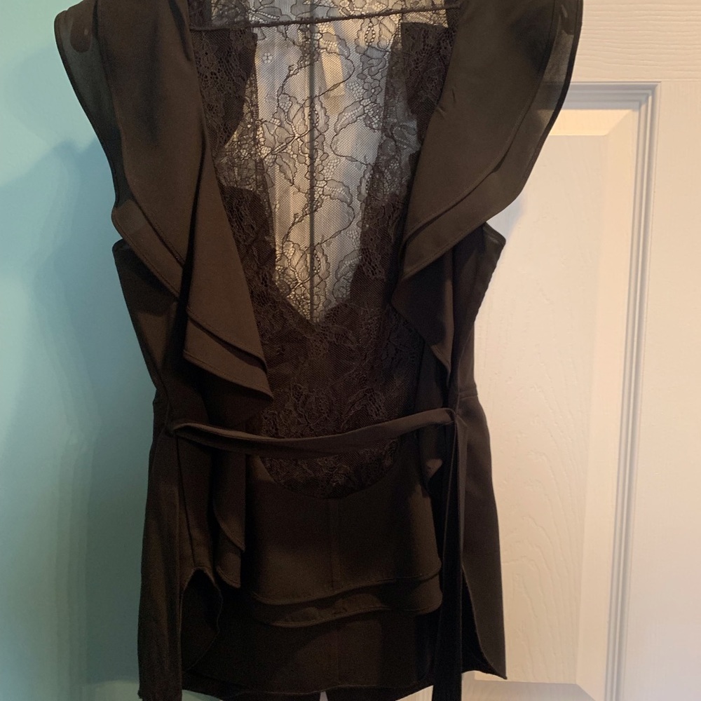 Diane Von Furstenberg ruffle and lace top. Size M